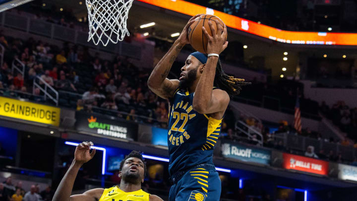 Feb 13, 2023; Indianapolis, Indiana, USA; Indiana Pacers forward Isaiah Jackson (22) rebounds the ball while Utah Jazz center Udoka Azubuike (20) defends in the second half at Gainbridge Fieldhouse. Mandatory Credit: Trevor Ruszkowski-USA TODAY Sports