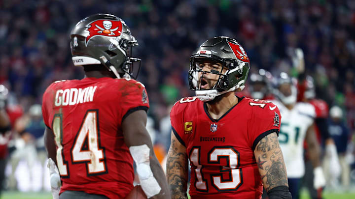 Tampa Bay Buccaneers wide receiver Chris Godwin (14) celebrates his touchdown with teammate wide receiver Mike Evans (13) . Tampa Bay Buccaneers wide receiver Chris Godwin (14) celebrates his touchdown with teammate wide receiver Mike Evans (13) .