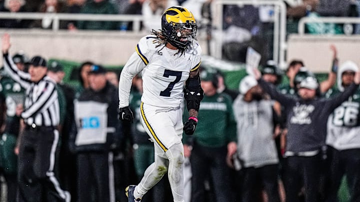 Michigan defensive back TJ Metcalf (7) celebrates a tackle against Michigan State during the second half at Spartan Stadium in East Lansing on Saturday, October 25, 2025.