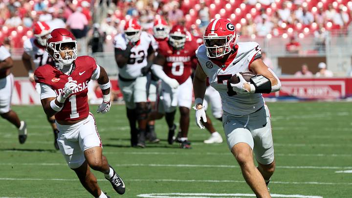 Sep 19, 2026; Fayetteville, Arkansas, USA; Georgia Bulldogs tight end Lawson Luckie (7) runs with the ball against the Georgia Bulldogs Arkansas Razorbacks defensive back Christian Harrison (1) at Donald W. Reynolds Razorback Stadium. Mandatory Credit: Nelson Chenault-Imagn Images Sep 19, 2026; Fayetteville, Arkansas, USA; Georgia Bulldogs tight end Lawson Luckie (7) runs with the ball against the Georgia Bulldogs Arkansas Razorbacks defensive back Christian Harrison (1) at Donald W. Reynolds Razorback Stadium. Mandatory Credit: Nelson Chenault-Imagn Images