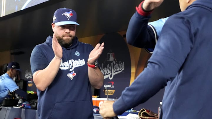 Oct 31, 2025; Toronto, Ontario, CAN; Toronto Blue Jays manager John Schneider (14) reacts in the dugout before game six of the 2025 MLB World Series between the Toronto Blue Jays and the Los Angeles Dodgers at Rogers Centre. Mandatory Credit: John E. Sokolowski-Imagn Images