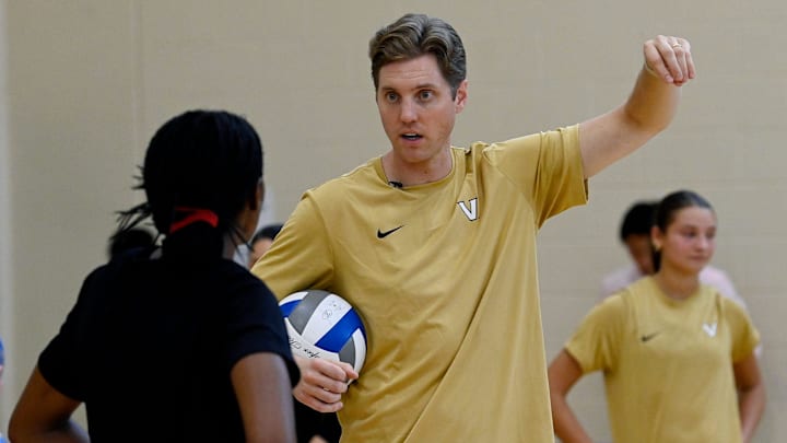 Vanderbilt volleyball head coach Anders Nelson talks with Jackie Moore during practice Tuesday, Sept. 3, 2024, in Nashville, Tenn.