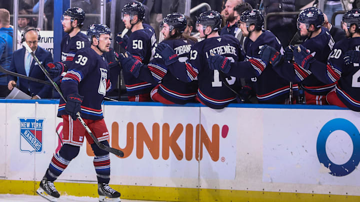 Jan 26, 2025; New York, New York, USA;  New York Rangers center Sam Carrick (39) celebrates with his teammates after scoring a goal in the first period against the Colorado Avalanche at Madison Square Garden. Mandatory Credit: Wendell Cruz-Imagn Images