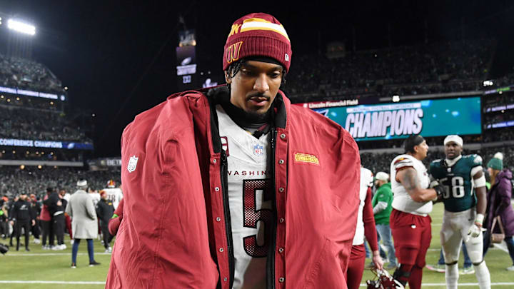 Jan 26, 2025; Philadelphia, PA, USA; Washington Commanders quarterback Jayden Daniels (5) walks off the field after losing the NFC Championship game against the Philadelphia Eagles at Lincoln Financial Field. Mandatory Credit: Eric Hartline-Imagn Images