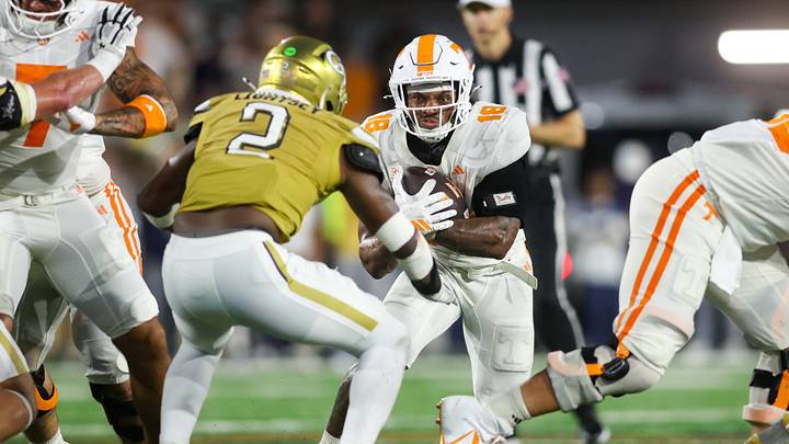Sep 12, 2026; Atlanta, Georgia, USA; Tennessee Volunteers running back DeSean Bishop (18) runs the ball for a touchdown against the Georgia Tech Yellow Jackets in the fourth quarter at Bobby Dodd Stadium at Hyundai Field. Mandatory Credit: Brett Davis-Imagn Images Sep 12, 2026; Atlanta, Georgia, USA; Tennessee Volunteers running back DeSean Bishop (18) runs the ball for a touchdown against the Georgia Tech Yellow Jackets in the fourth quarter at Bobby Dodd Stadium at Hyundai Field. Mandatory Credit: Brett Davis-Imagn Images