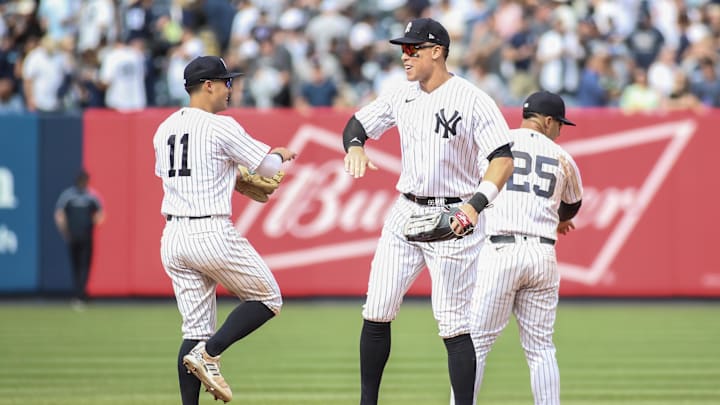 Apr 16, 2023; Bronx, New York, USA;  New York Yankees shortstop Anthony Volpe (11) and New York