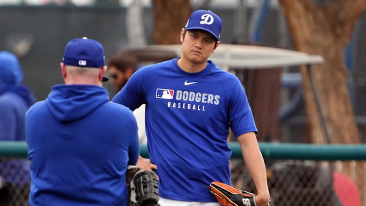 Ohtani looks on during a Spring Training workout. 