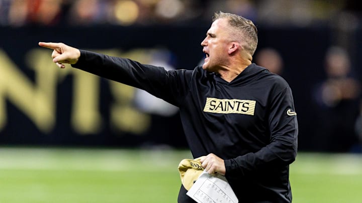 Nov 17, 2024; New Orleans, Louisiana, USA;  New Orleans Saints interim head coach Darren Rizzi reacts to a play against the Cleveland Browns during the first half at Caesars Superdome. Mandatory Credit: Stephen Lew-Imagn Images