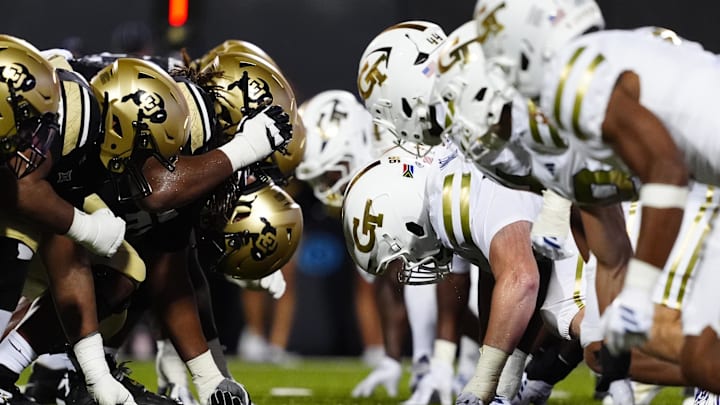 Aug 29, 2025; Boulder, Colorado, USA; Members of the Colorado Buffaloes line across from the Georgia Tech Yellow Jackets during the fourth quarter at Folsom Field. Mandatory Credit: Ron Chenoy-Imagn Images