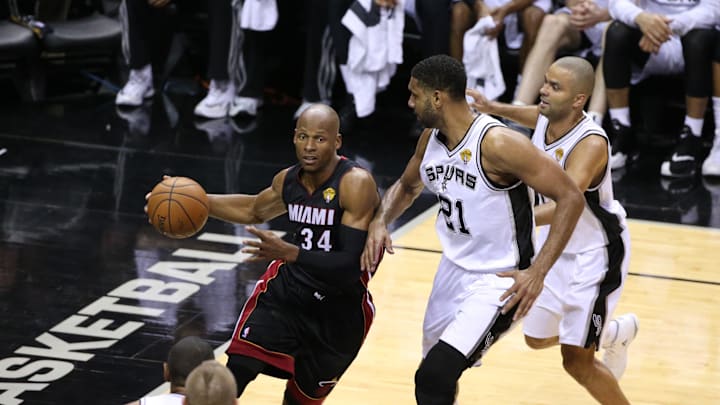 Jun 15, 2014; San Antonio, TX, USA; Miami Heat guard Ray Allen (34) drives against San Antonio Spurs forward Tim Duncan (21) in game five of the 2014 NBA Finals at AT&T Center. Mandatory Credit: Soobum Im-Imagn Images Jun 15, 2014; San Antonio, TX, USA; Miami Heat guard Ray Allen (34) drives against San Antonio Spurs forward Tim Duncan (21) in game five of the 2014 NBA Finals at AT&T Center. Mandatory Credit: Soobum Im-Imagn Images