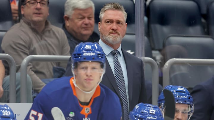Dec 2, 2025; Elmont, New York, USA; New York Islanders head coach Patrick Roy coaches against the Tampa Bay Lightning during the first period at UBS Arena. Mandatory Credit: Brad Penner-Imagn Images