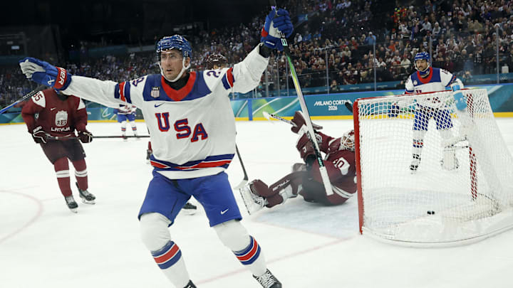 Feb 12, 2026; Milan, Italy;  Brock Nelson of United States celebrates scoring their second goal against Latvia in men's ice hockey group C play during the Milano Cortina 2026 Olympic Winter Games at Milano Santagiulia Ice Hockey Arena. Mandatory Credit: Geoff Burke-Imagn Images