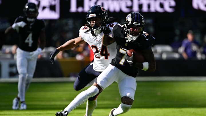 Oct 26, 2025; Baltimore, Maryland, USA; Baltimore Ravens wide receiver Rashod Bateman (7) runs after making a catch as Chicago Bears cornerback Nick McCloud (24) defends at M&T Bank Stadium. Oct 26, 2025; Baltimore, Maryland, USA; Baltimore Ravens wide receiver Rashod Bateman (7) runs after making a catch as Chicago Bears cornerback Nick McCloud (24) defends at M&T Bank Stadium.