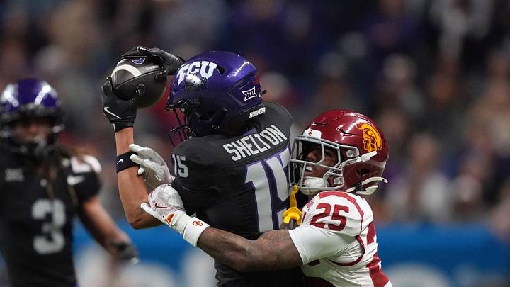 Dec 30, 2025; San Antonio, TX, USA; TCU Horned Frogs wide receiver Terry Shelton (15) catches the ball against Southern California Trojans cornerback Marcelles Williams (25) in the first half during the Alamo Bowl at Alamodome. Mandatory Credit: Kirby Lee-Imagn Images Dec 30, 2025; San Antonio, TX, USA; TCU Horned Frogs wide receiver Terry Shelton (15) catches the ball against Southern California Trojans cornerback Marcelles Williams (25) in the first half during the Alamo Bowl at Alamodome. Mandatory Credit: Kirby Lee-Imagn Images
