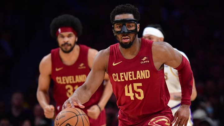 Apr 6, 2024; Los Angeles, California, USA; Cleveland Cavaliers guard Donovan Mitchell (45) moves the ball up court against the against the Los Angeles Lakers during the first half at Crypto.com Arena. Mandatory Credit: Gary A. Vasquez-USA TODAY Sports