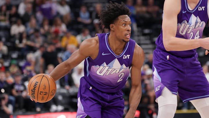 Mar 25, 2025; Salt Lake City, Utah, USA;  Utah Jazz guard Collin Sexton (2) controls the ball during the first quarter against the Memphis Grizzlies at Delta Center. Mandatory Credit: Chris Nicoll-Imagn Images