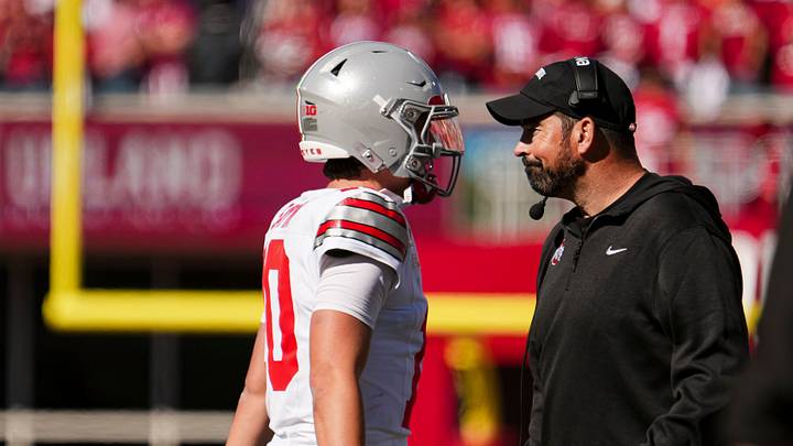 Ohio State Buckeyes quarterback Julian Sayin (10) leaves the field past Ohio State Buckeyes head coach Ryan Day during the NCAA football game against the Indiana Hoosiers at Memorial Stadium Stadium in Bloomington, Ind. on Oct. 17, 2026. Ohio State Buckeyes quarterback Julian Sayin (10) leaves the field past Ohio State Buckeyes head coach Ryan Day during the NCAA football game against the Indiana Hoosiers at Memorial Stadium Stadium in Bloomington, Ind. on Oct. 17, 2026.