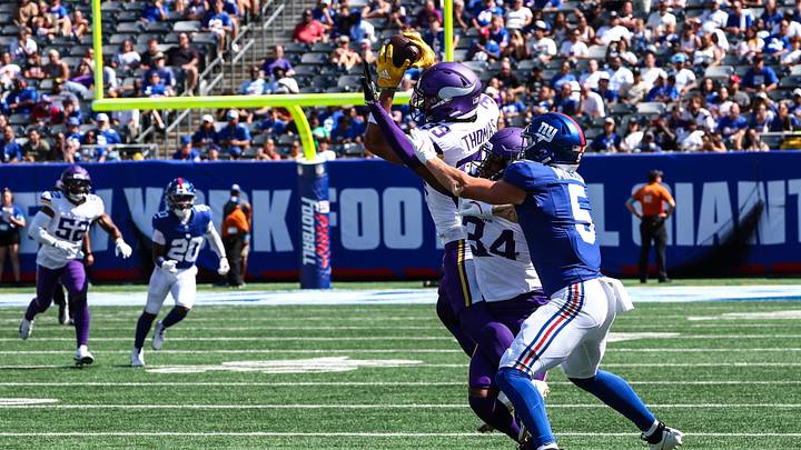 Aug 15, 2026; East Rutherford, New Jersey, USA; Minnesota Vikings safety Jacob Thomas (39) intercepts a pass intended for New York Giants wide receiver Ryan Miller (5) during the second half at MetLife Stadium. Aug 15, 2026; East Rutherford, New Jersey, USA; Minnesota Vikings safety Jacob Thomas (39) intercepts a pass intended for New York Giants wide receiver Ryan Miller (5) during the second half at MetLife Stadium.