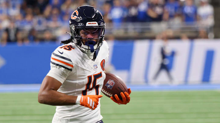 Sep 14, 2025; Detroit, Michigan, USA; Chicago Bears wide receiver Rome Odunze (15) carries the ball for a touchdown against the Detroit Lions during the first quarter at Ford Field. Mandatory Credit: David Reginek-Imagn Images
