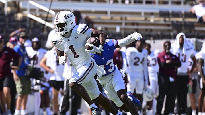 Sep 21, 2024; Starkville, Mississippi, USA; Mississippi State Bulldogs wide receiver Kelly Akharaiyi (1) runs the ball against the Florida Gators during the fourth quarter at Davis Wade Stadium at Scott Field. Mandatory Credit: Matt Bush-Imagn Images