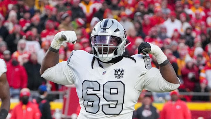 Nov 29, 2024; Kansas City, Missouri, USA; Las Vegas Raiders defensive tackle Adam Butler (69) celebrates after making a sack against the Kansas City Chiefs during the second half at GEHA Field at Arrowhead Stadium. Mandatory Credit: Denny Medley-Imagn Images