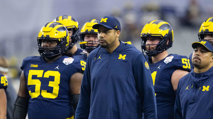 Dec 31, 2022; Glendale, Arizona, USA; Michigan Wolverines tight ends coach Grant Newsome against the TCU Horned Frogs during the 2022 Fiesta Bowl at State Farm Stadium. Mandatory Credit: Mark J. Rebilas-Imagn Images