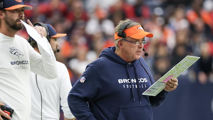Dec 3, 2023; Houston, Texas, USA; Denver Broncos head coach Sean Payton looks at his play card while