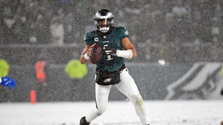 Jan 19, 2025; Philadelphia, Pennsylvania, USA; Philadelphia Eagles quarterback Jalen Hurts (1) looks for a receiver during the fourth quarter against the Los Angeles Rams in a 2025 NFC divisional round game at Lincoln Financial Field. Mandatory Credit: Eric Hartline-Imagn Images