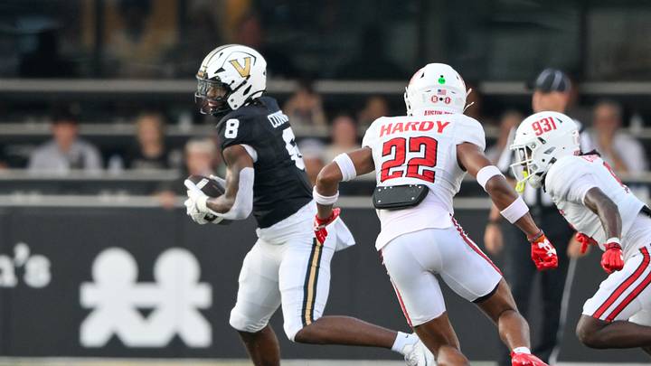 Sep 5, 2026; Nashville, Tennessee, USA; Vanderbilt Commodores tight end Jayvontay Conner (8) runs after the catch against the Austin Peay Governors defensive lineman RJ Jackson (93) and defensive back Trevor Hardy (22) during the first half at FirstBank Stadium. Mandatory Credit: Steve Roberts-Imagn Images Sep 5, 2026; Nashville, Tennessee, USA; Vanderbilt Commodores tight end Jayvontay Conner (8) runs after the catch against the Austin Peay Governors defensive lineman RJ Jackson (93) and defensive back Trevor Hardy (22) during the first half at FirstBank Stadium. Mandatory Credit: Steve Roberts-Imagn Images