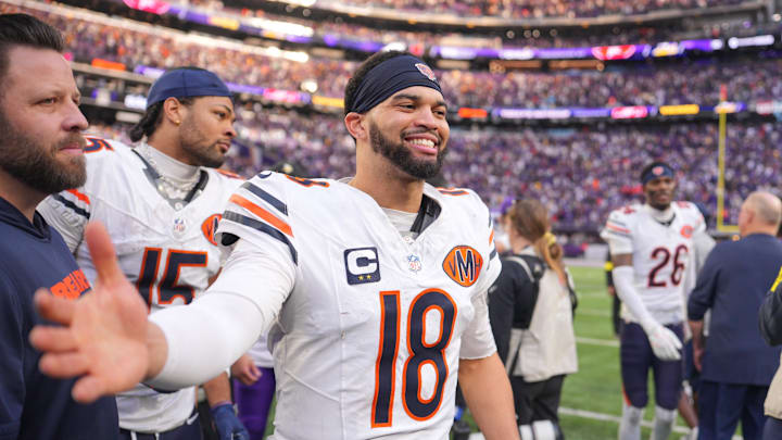 Nov 16, 2025; Minneapolis, Minnesota, USA;  Chicago Bears quarterback Caleb Williams (18) greets a Minnesota Vikings player following a game at U.S. Bank Stadium. Mandatory Credit: Brad Rempel-Imagn Images