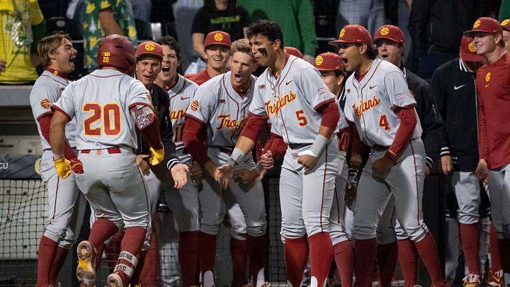 USC celebrates a home run by Isaac Cadena (20) as the Oregon Ducks host the USC Trojans on May 14, 2026, in Eugene, Oregon.
