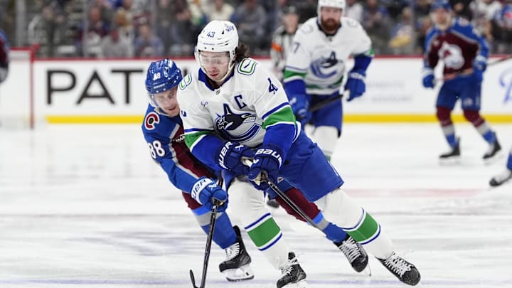 Dec 2, 2025; Denver, Colorado, USA; Colorado Avalanche center Martin Necas (88) defends on Vancouver Canucks defenseman Quinn Hughes (43) during the second period at Ball Arena. Mandatory Credit: Ron Chenoy-Imagn Images Dec 2, 2025; Denver, Colorado, USA; Colorado Avalanche center Martin Necas (88) defends on Vancouver Canucks defenseman Quinn Hughes (43) during the second period at Ball Arena. Mandatory Credit: Ron Chenoy-Imagn Images