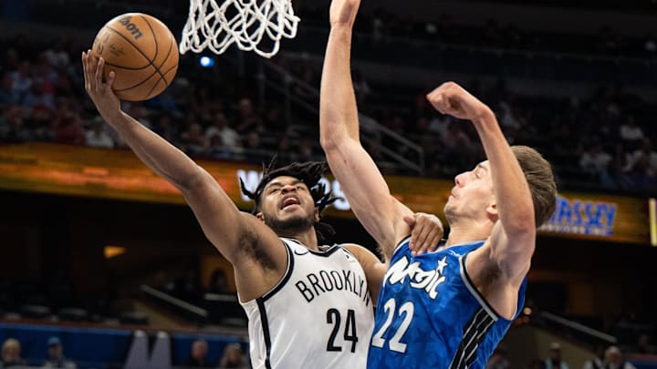 Brooklyn Nets guard Cam Thomas (24) shoots over Orlando Magic forward Franz Wagner (22) last year.