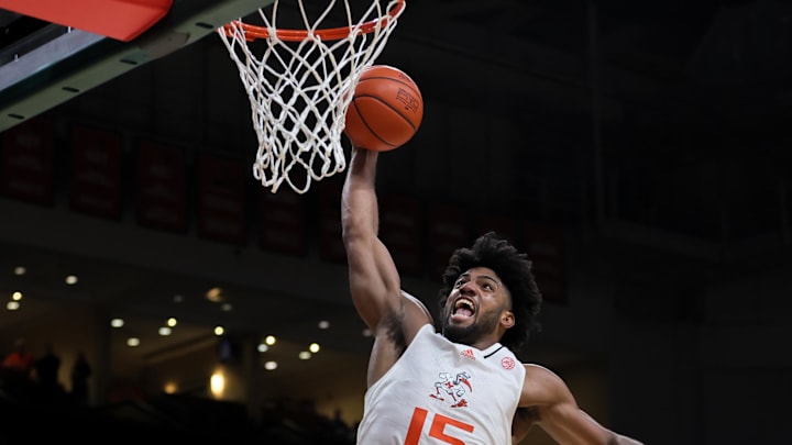 Mar 6, 2024; Coral Gables, Florida, USA; Miami Hurricanes forward Norchad Omier (15) dunks the