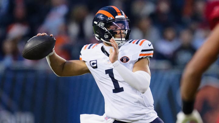 Dec 24, 2023; Chicago, Illinois, USA;  Chicago Bears quarterback Justin Fields (1) in action against the Arizona Cardinals at Soldier Field. Mandatory Credit: Jamie Sabau-USA TODAY Sports