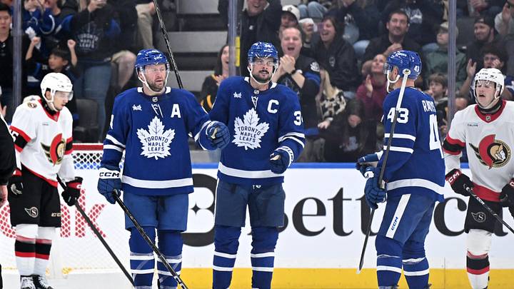 Sep 23, 2026; Toronto, Ontario, CAN; Toronto Maple Leafs defenseman Morgan Rielly (44) celebrates with forward Auston Matthews (34) and defenseman Darren Raddysh (43) after scoring a goal against the Ottawa Senators in the second period at Scotiabank Arena. Mandatory Credit: Dan Hamilton-Imagn Images Sep 23, 2026; Toronto, Ontario, CAN; Toronto Maple Leafs defenseman Morgan Rielly (44) celebrates with forward Auston Matthews (34) and defenseman Darren Raddysh (43) after scoring a goal against the Ottawa Senators in the second period at Scotiabank Arena. Mandatory Credit: Dan Hamilton-Imagn Images