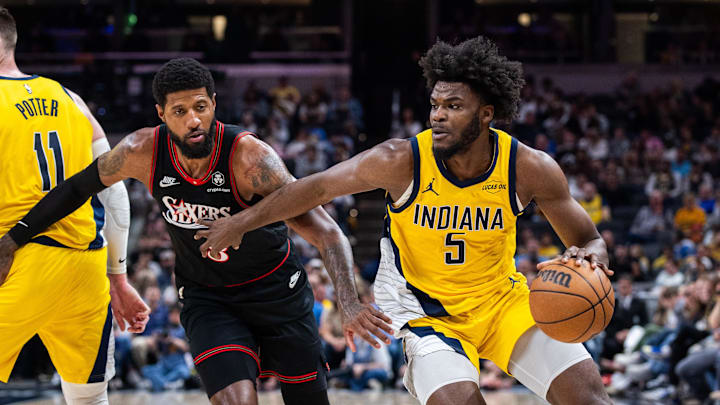 Apr 10, 2026; Indianapolis, Indiana, USA; Indiana Pacers forward Jarace Walker (5) drives to the basket against Philadelphia 76ers forward Paul George (8) during the first half at Gainbridge Fieldhouse. Mandatory Credit: Trevor Ruszkowski-Imagn Images Apr 10, 2026; Indianapolis, Indiana, USA; Indiana Pacers forward Jarace Walker (5) drives to the basket against Philadelphia 76ers forward Paul George (8) during the first half at Gainbridge Fieldhouse. Mandatory Credit: Trevor Ruszkowski-Imagn Images