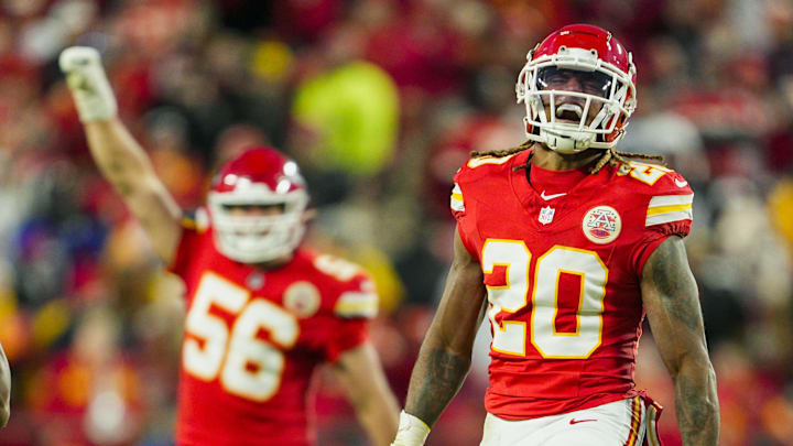 Nov 29, 2024; Kansas City, Missouri, USA; Kansas City Chiefs safety Justin Reid (20) and defensive end George Karlaftis (56) celebrate after a play during the second half against the Las Vegas Raiders at GEHA Field at Arrowhead Stadium. Mandatory Credit: Jay Biggerstaff-Imagn Images