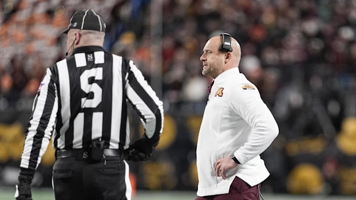 Jan 3, 2025; Charlotte, NC, USA; Minnesota Golden Gophers head coach P.J. Fleck during the first quarter against the Virginia Tech Hokies at the Dukes’ Mayo Bowl at Bank of America Stadium. Mandatory Credit: Jim Dedmon-Imagn Images