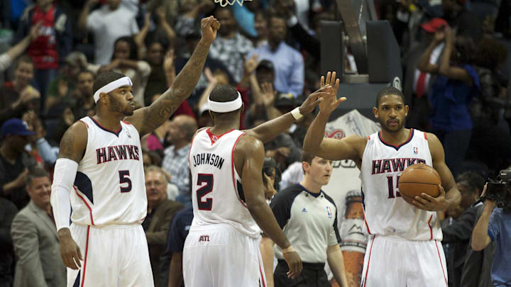 Mar 30, 2011; Atlanta, GA, USA; Atlanta Hawks power forward Josh Smith (5), shooting guard Joe Johnson (2), and center Al Horford (15) react after their victory over the Orlando Magic at Philips Arena. The Hawks defeated the Magic, 85-82. Mandatory Credit: Dale Zanine-Imagn Images Mar 30, 2011; Atlanta, GA, USA; Atlanta Hawks power forward Josh Smith (5), shooting guard Joe Johnson (2), and center Al Horford (15) react after their victory over the Orlando Magic at Philips Arena. The Hawks defeated the Magic, 85-82. Mandatory Credit: Dale Zanine-Imagn Images