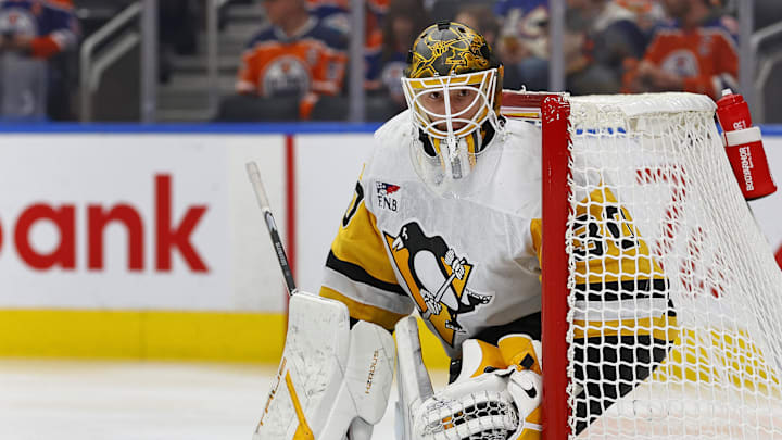 Oct 25, 2024; Edmonton, Alberta, CAN; Pittsburgh Penguins goaltender Joel Blomqvist (30) follows the play against the Edmonton Oilers at Rogers Place. Mandatory Credit: Perry Nelson-Imagn Images