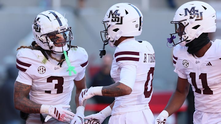 Mississippi State Bulldogs wide receiver Anthony Evans III (3) celebrates after scoring a touchdown during the third quarter against the Arkansas Razorbacks at Donald W. Reynolds Razorback Stadium. Bulldogs won 38-35.