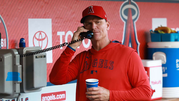 Jun 21, 2025; Anaheim, California, USA; Los Angeles Angels acting manager Ray Montgomery (81) talks on a bullpen phone before the game against the Houston Astros at Angel Stadium. Mandatory Credit: Kiyoshi Mio-Imagn Images Jun 21, 2025; Anaheim, California, USA; Los Angeles Angels acting manager Ray Montgomery (81) talks on a bullpen phone before the game against the Houston Astros at Angel Stadium. Mandatory Credit: Kiyoshi Mio-Imagn Images