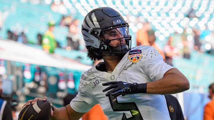 Oregon quarterback Dante Moore throws a pass as the Oregon Ducks take on the Texas Tech Red Raiders in the Orange Bowl on Jan. 1, 2026, at Hard Rock Stadium in Miami, Florida.