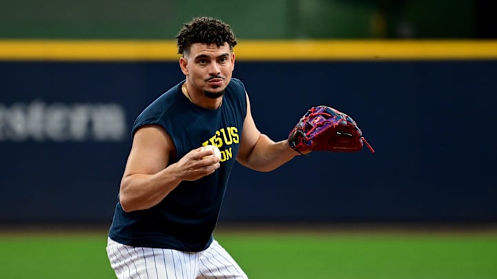 Oct 2, 2024; Milwaukee, Wisconsin, USA; Milwaukee Brewers shortstop Willy Adames (27) warms up before game two of the Wildcard round for the 2024 MLB Playoffs against the New York Mets at American Family Field. Mandatory Credit: Benny Sieu-Imagn Images Oct 2, 2024; Milwaukee, Wisconsin, USA; Milwaukee Brewers shortstop Willy Adames (27) warms up before game two of the Wildcard round for the 2024 MLB Playoffs against the New York Mets at American Family Field. Mandatory Credit: Benny Sieu-Imagn Images