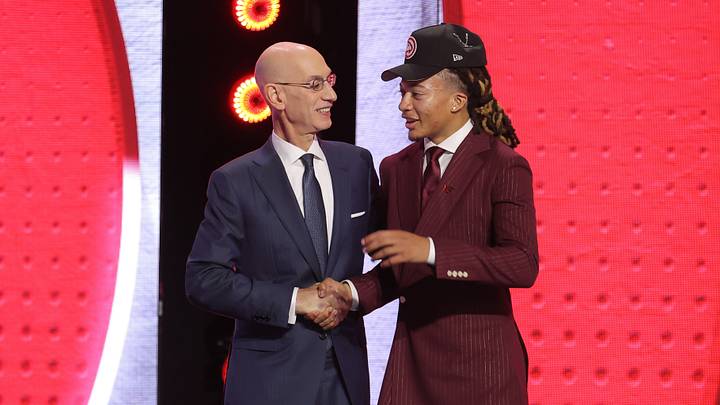 Jun 23, 2026; New York, NY, USA; NBA commissioner Adam Silver greets the eighth pick in the 2026 NBA draft, Houston guard Kingston Flemings after he was selected by the Atlanta Hawks at Barclays Center. Mandatory Credit: Brad Penner-Imagn Images