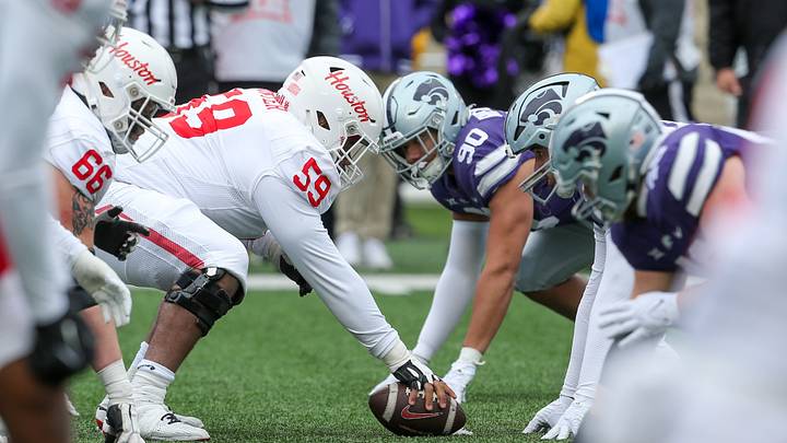 Oct 28, 2023; Manhattan, Kansas, USA; The Houston Cougars face off against the Kansas State Wildcats during the fourth quarter at Bill Snyder Family Football Stadium. Mandatory Credit: Scott Sewell-USA TODAY Sports Oct 28, 2023; Manhattan, Kansas, USA; The Houston Cougars face off against the Kansas State Wildcats during the fourth quarter at Bill Snyder Family Football Stadium. Mandatory Credit: Scott Sewell-USA TODAY Sports