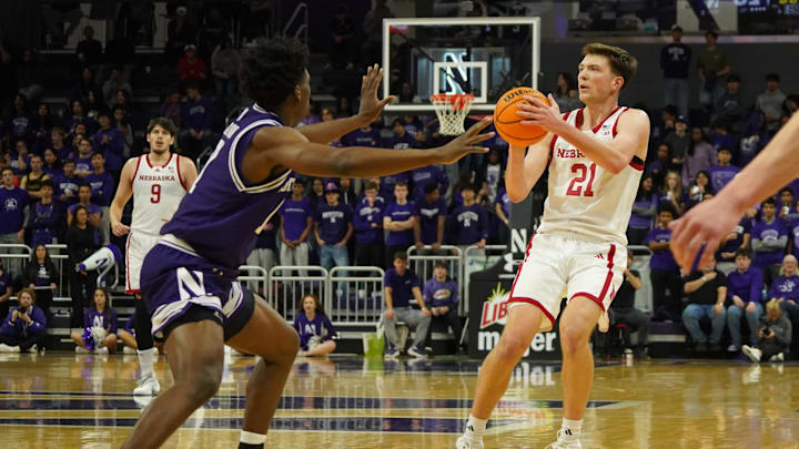 Jan 17, 2026; Evanston, Illinois, USA; Nebraska Cornhuskers forward Pryce Sandfort (21) shoots a three point basket on Northwestern Wildcats forward Tre Singleton (8) during the first half at Welsh-Ryan Arena. Mandatory Credit: David Banks-Imagn Images