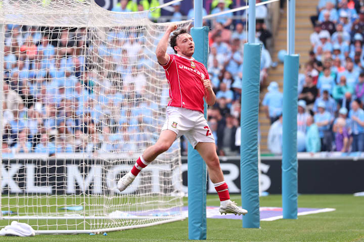 Ollie Rathbone in celebration.