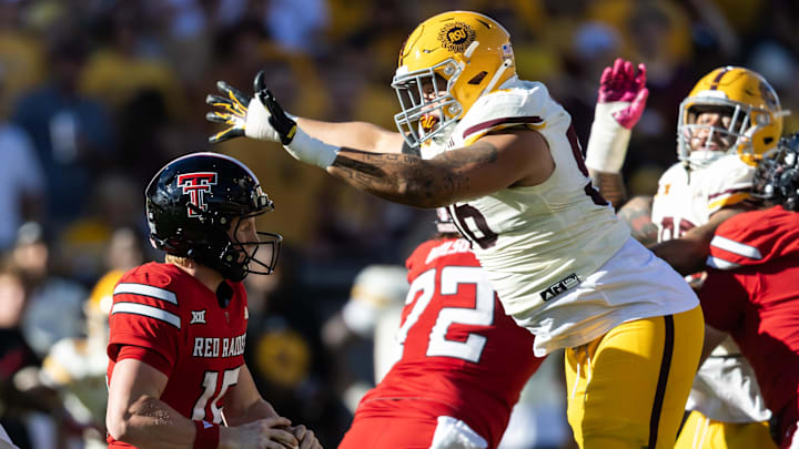 Oct 18, 2025; Tempe, Arizona, USA; Arizona State Sun Devils defensive lineman Anthonie Cooper (96) sacks Texas Tech Red Raiders quarterback Will Hammond (15) in the second half at Mountain America Stadium. Mandatory Credit: Mark J. Rebilas-Imagn Images